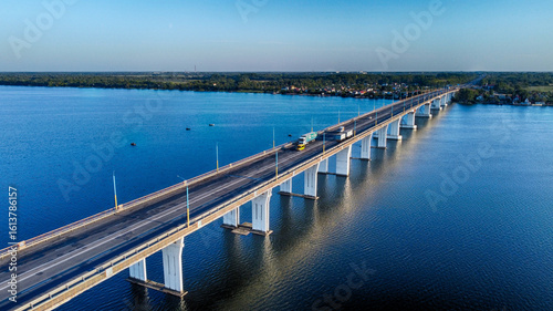 Wallpaper Mural Aerial view of the bridge slicing through the dark blue waters, connecting distant shores under a clear sky, Kherson, Kherson Oblast, Ukraine. Torontodigital.ca