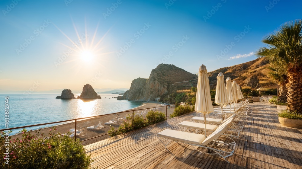 Fototapeta premium Luxury beach club in Sicily with white sun loungers under palm trees at sunset, clear blue sky, golden light, lush vegetation, scenic cliffs, and tranquil seashore viewed on a bright sunny summer day