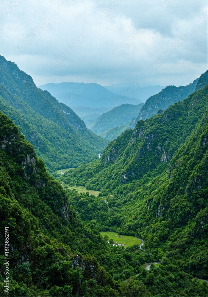 Naklejka premium Verdant mountain valley landscape