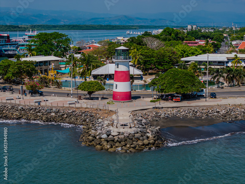 Beautiful aerial and coastal views of Puntarenas, Costa Rica — featuring the iconic red-and-white lighthouse, scenic peninsula, calm beaches, and authentic seaside charm.