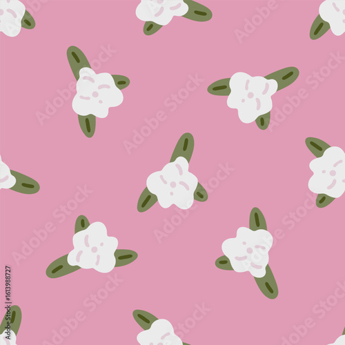 Seamless Pink Floral Pattern Design. Repeating flat cartoon flowers with white petals and green leaves on a pastel pink background.