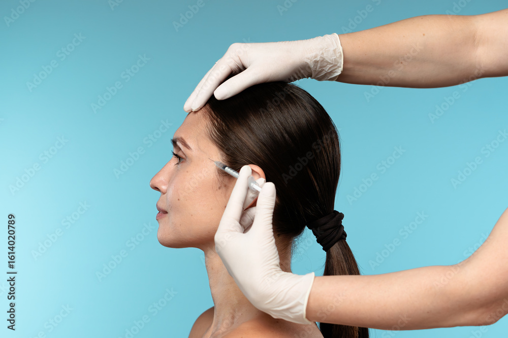 Fototapeta premium Aesthetic Procedure Woman Receiving Facial Injection Close-up