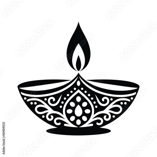Ornate diya lamp with flame oil lamp fire