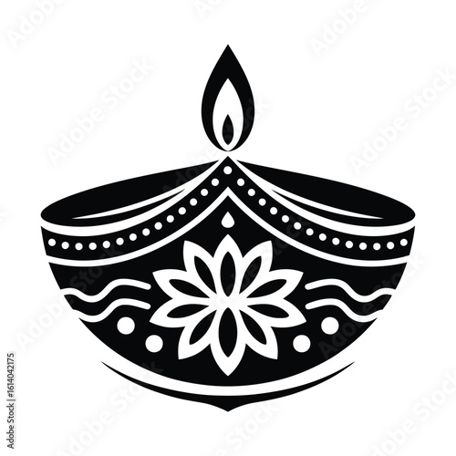 Ornate diya with flame and floral design lamp oil lamp