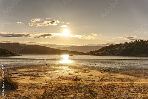 Sandy beach on the island of Rab, Croatia in the morning with sunrise.