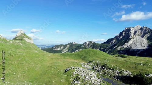 4K Drone Flying Over Dubrovnik, Croatia, on a Bright Sunny Day with Clear View of the Historic Old Town and Sparkling Adriatic Sea