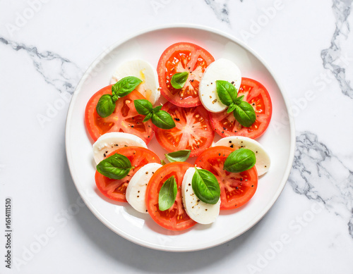 Caprese salad with basil