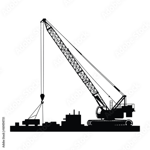 Silhouette of a crawler crane lifting cargo at a construction site or port