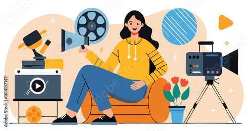 Cheerful filmmaker sits amid the camera equipment holding a movie reel for creating cinema production