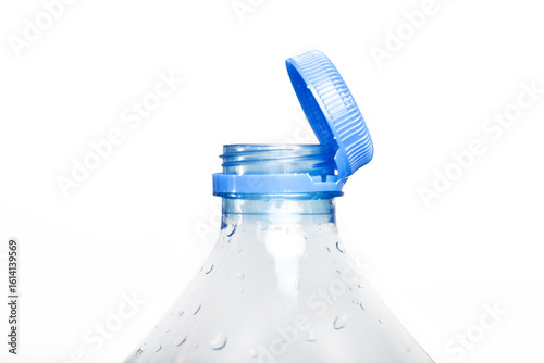 Vászonkép Close up of new cap attached to plastic bottle, connected to the neck of the bottle by solid tab attached to safety ring