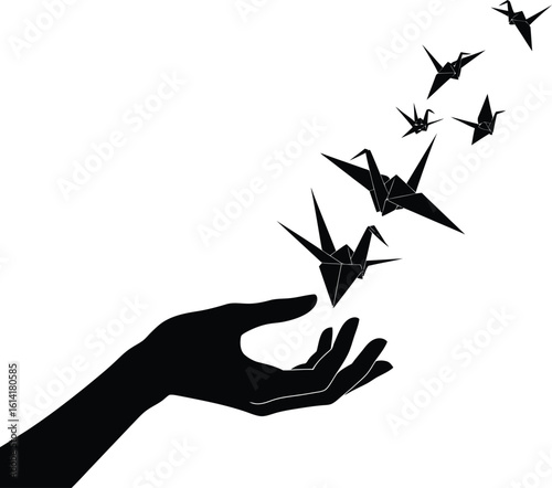 Poetic Silhouette: Origami Hand Releasing Paper Cranes