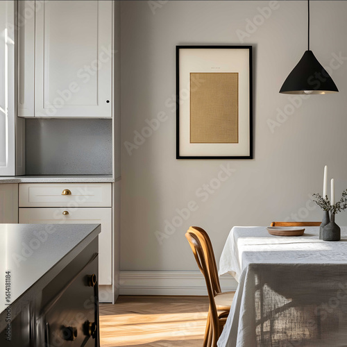a professional interior photograph of a Midcentury modern kitchen A vertical poster frame on the wall Cotton tablecloth on the table Closeup shot of the frame 19thc