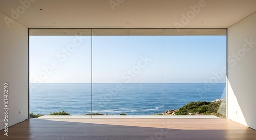 Modern minimalist interior with expansive ocean views.