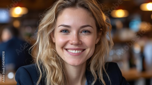 Confident female business professional engages in a dynamic discussion at a cozy caf setting.