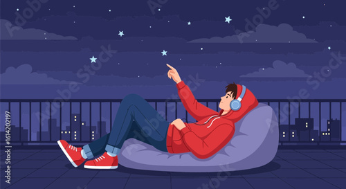 Young Man Relaxes On Rooftop Gazing Stars With Headphones At Night City Skyline