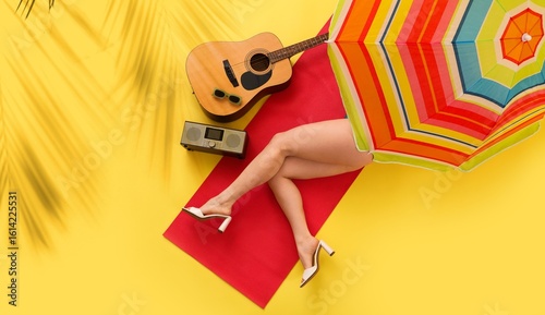 Young woman with beach umbr...