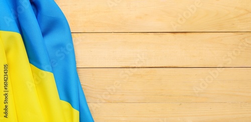 Flag of Ukraine on wooden b...