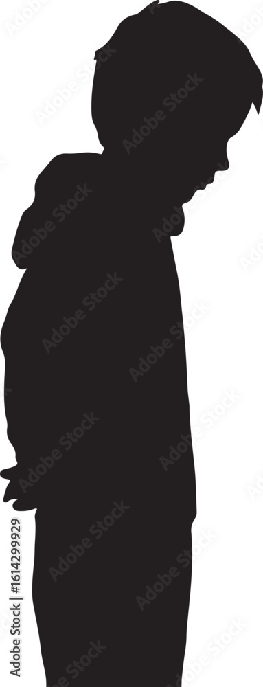 Black silhouette of a boy looking down with hands behind back child Black silhouette of a boy looking down with hands behind back child