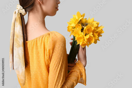 Beautiful young woman with ...