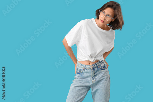 Beautiful young woman in st...
