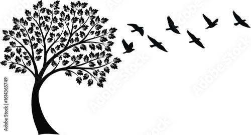 Silhouette of a majestic tree with a flock of birds flying away into the sky symbolizing freedom and change