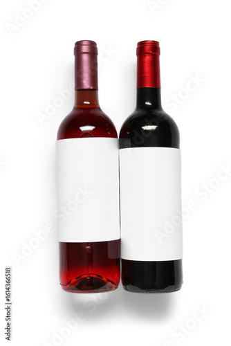Bottles of wine on white ba...