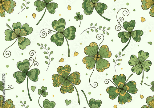 Seamless pattern featuring hand-drawn three- and four-leaf clovers with soft rounded shapes in rich greens on a light cream or pale green background. Festive and simple design for St. Patrick’s Day th