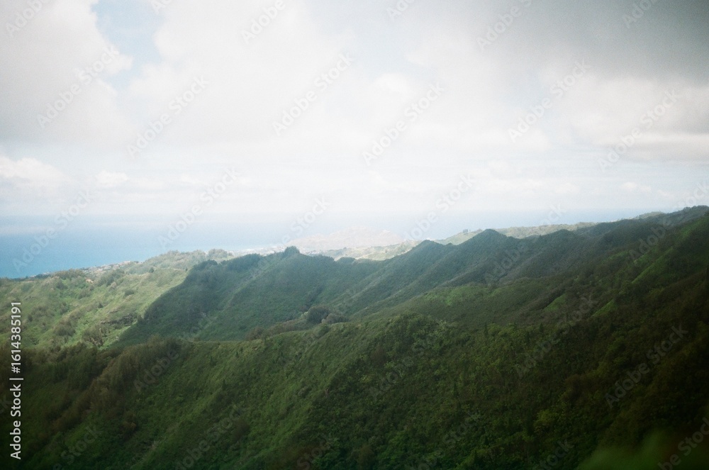 Naklejka premium clouds over the mountains