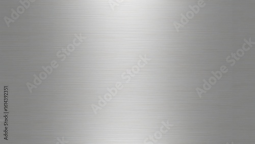 Photo of a brushed metal texture creates a sleek and modern background with subtle light reflections