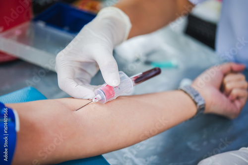 Wallpaper Mural Close up hand of nurse, taking blood sample from a patient in the hospital.	 Torontodigital.ca