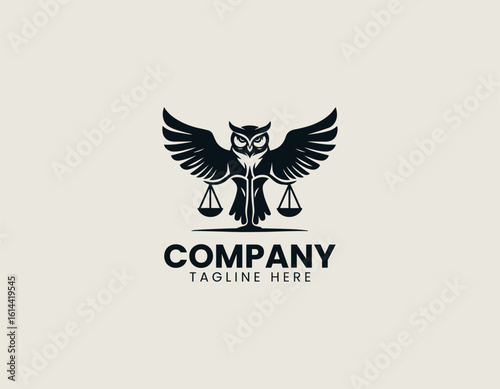 Majestic golden owl with outstretched wings holding scales of justice on a dark background. Legal concept