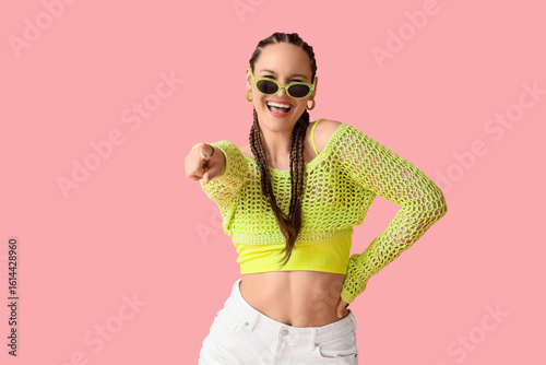 Stylish young woman in croc...