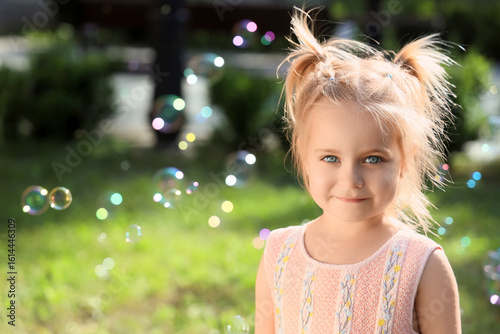 Cute little girl with soap ...