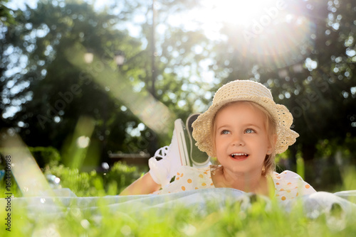Cute little girl lying on p...