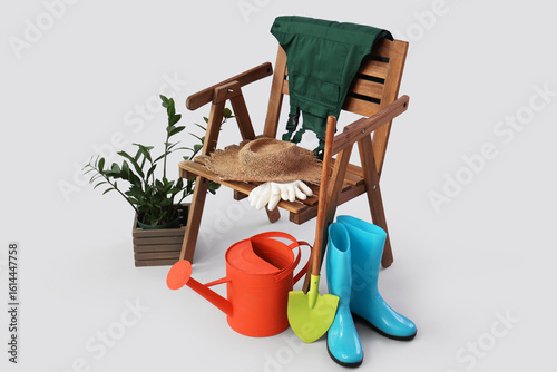 Wooden armchair with plants...