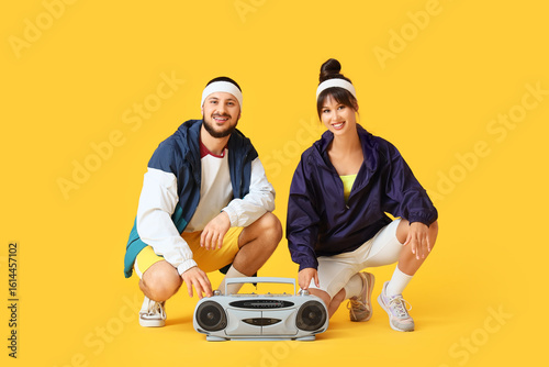 Young couple with boombox o...