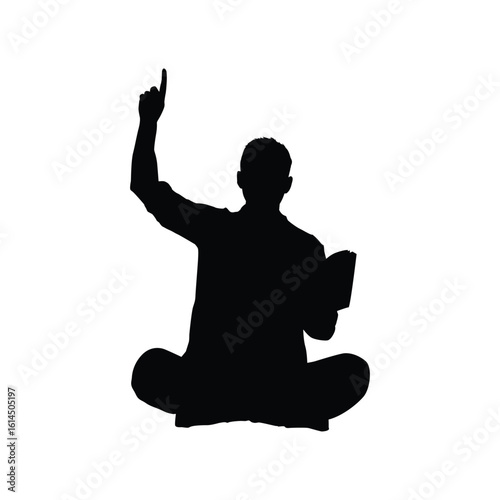 Silhouette of a man reading a book while sitting and pointing his finger upwards