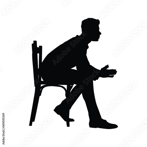 Silhouette of a Seated Man in Thoughtful Contemplation Viewed in Profile