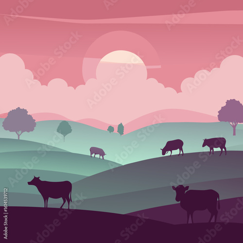 Pastoral landscape with cows grazing under a pink sunset sky