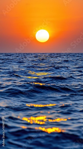 Vibrant Sunset Over Calm Ocean Waves Highlighting Nature's Serenity and Beauty