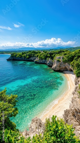 Serene Tropical Beach with Crystal Clear Water and Lush Greenery Under Blue Sky