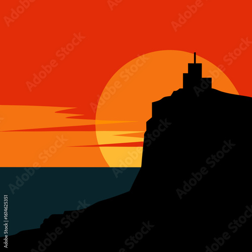 Dramatic sunset over a coastal cliff with a lighthouse silhouette