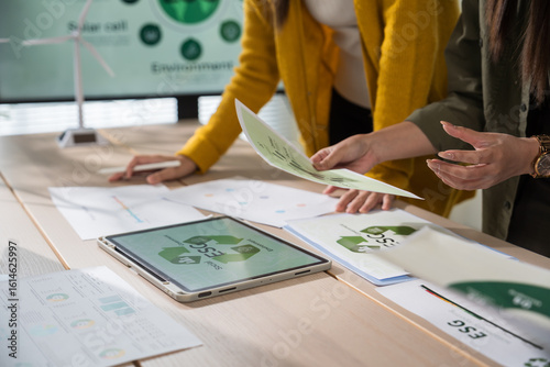 Asian business leaders meet to strategize on implementing sustainable practices, focusing on reuse, recycling, and environmental protection for a greener future