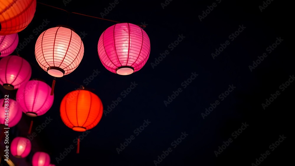Obraz premium Colorful Japanese paper lanterns glowing at night during the Obon Festival, capturing the beauty of traditional Asian culture, celebration, and festive decorative lighting.