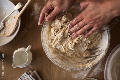 Εκτύπωση καμβά Female hands kneading dough for home baking