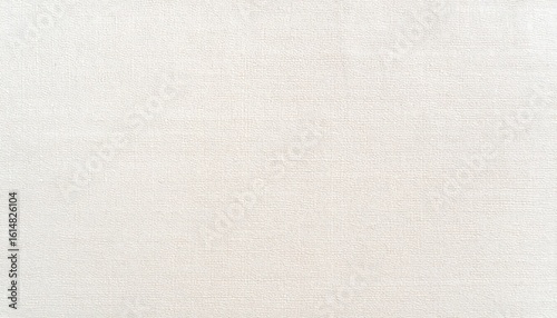 Close-up of a subtly textured, off-white fabric surface