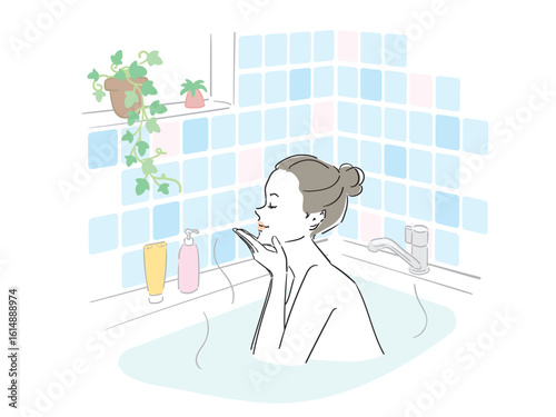 気持ちよさそうに入浴する綺麗な女性