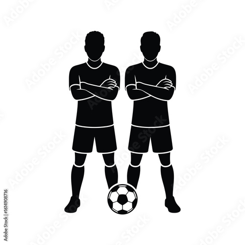 Two soccer players silhouetted with arms crossed beside a ball