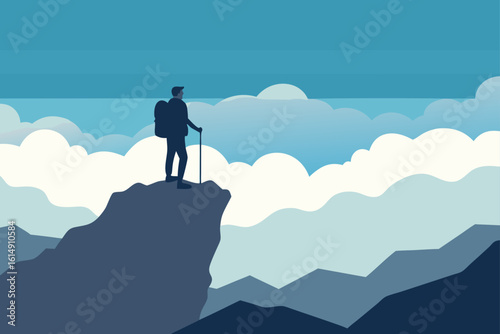 Silhouette of a hiker standing on a mountain peak overlooking clouds