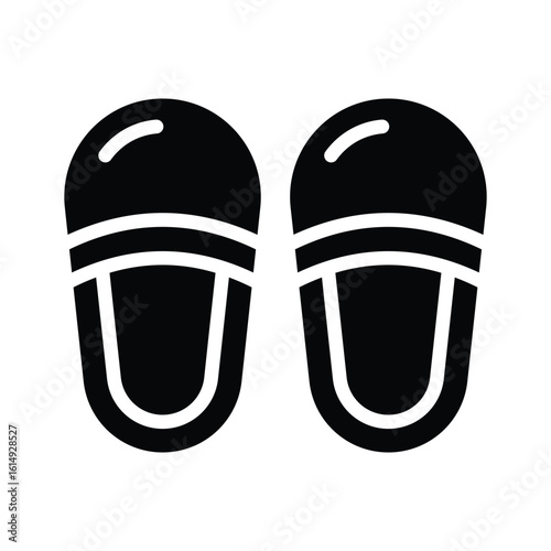 Trendy glyph style icon of soft home slippers pair